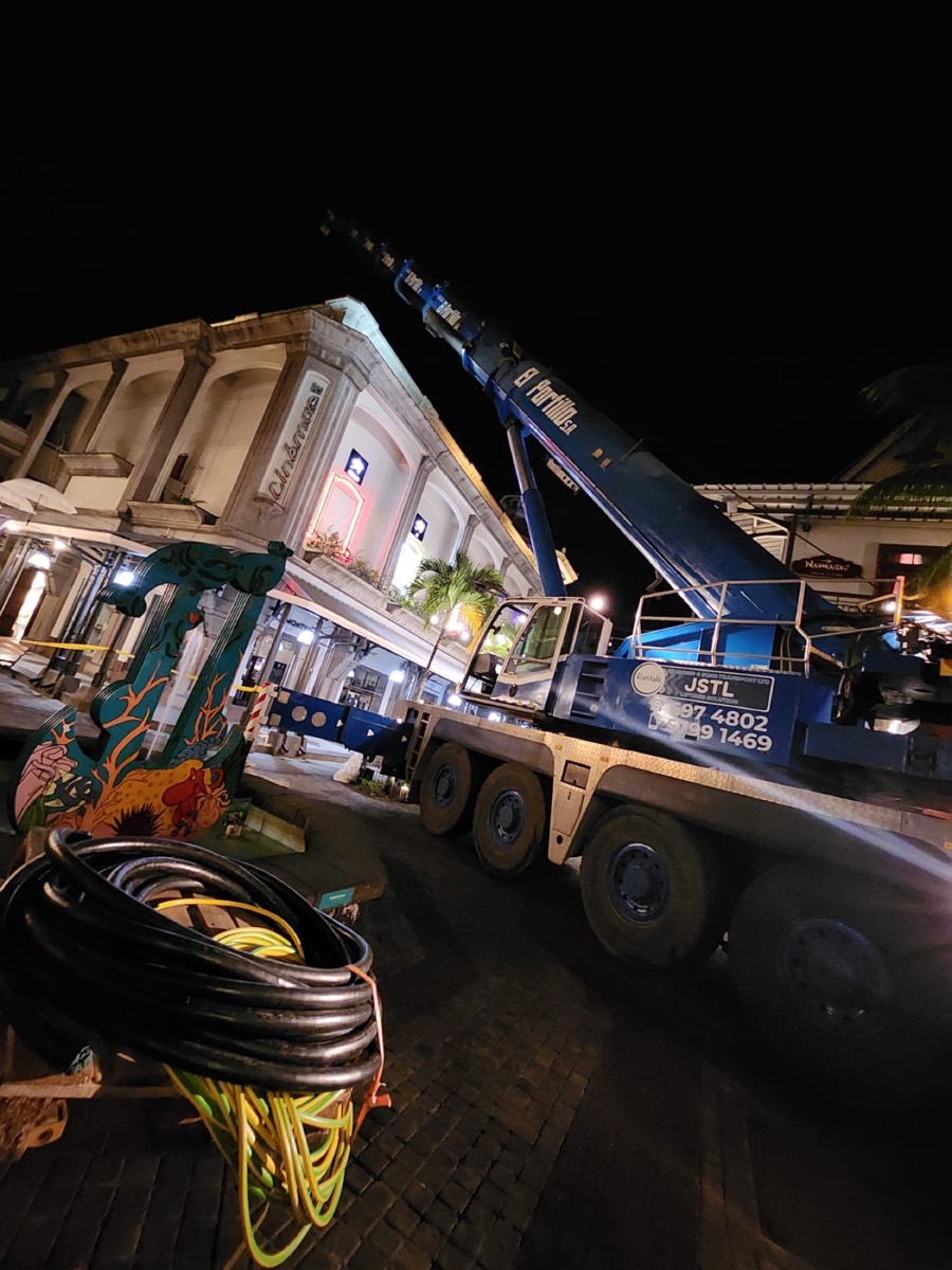 JSTL crane at night with cabling