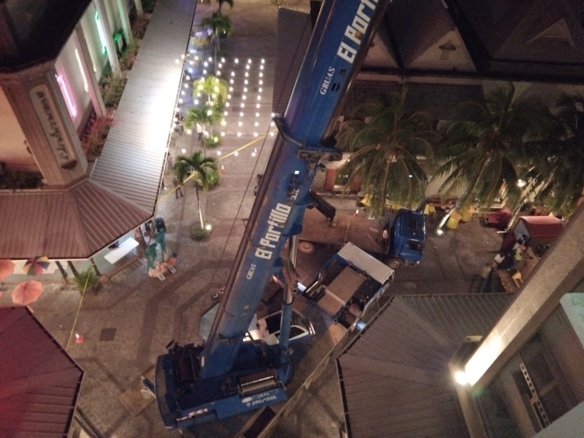 JSTL crane at the waterfront at night