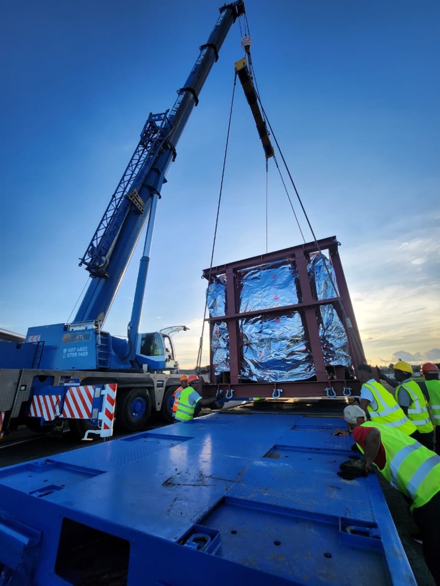 JSTL crane loading a cargo aircraft